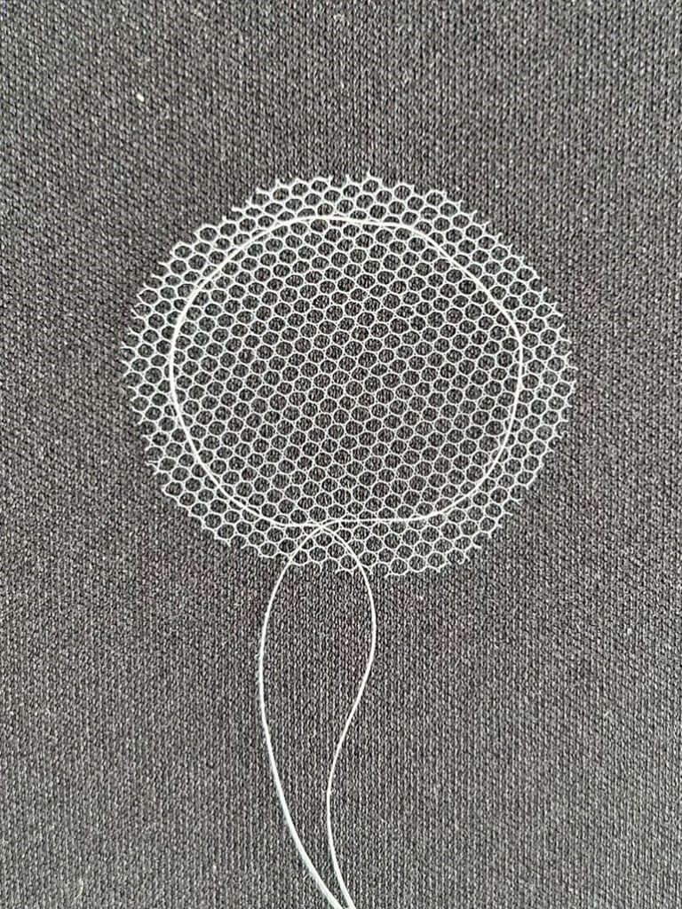 A tulle circle with a drawstring.